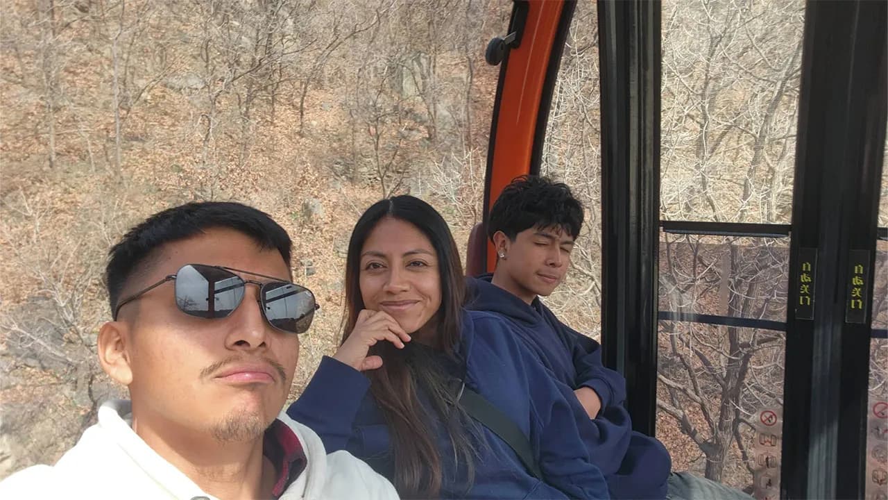Ivan and his family visiting a Beijing attraction during the first part of their China trip